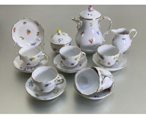 A Meissen coffee service for six, 20th century, comprising baluster coffee pot, cream jug, sucrier (associated) and six cups 