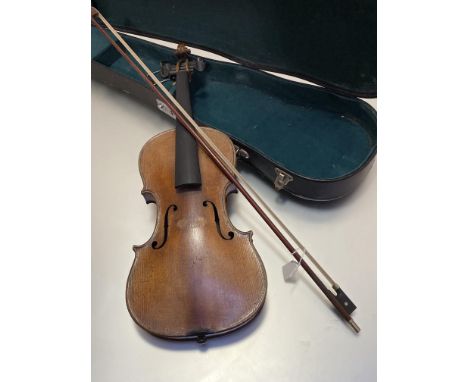 A French violin, c. 1900, the bridge stamped J.T.L., with one piece figured back, cased with an unmarked bow. Length of back 