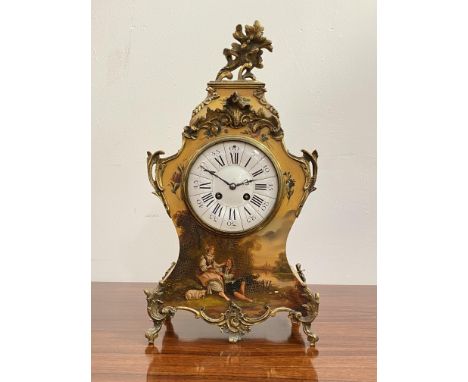 A French Vernis Martin style mantel clock, late 19th century, the case of cartouche form with floral cast gilt metal mounts, 