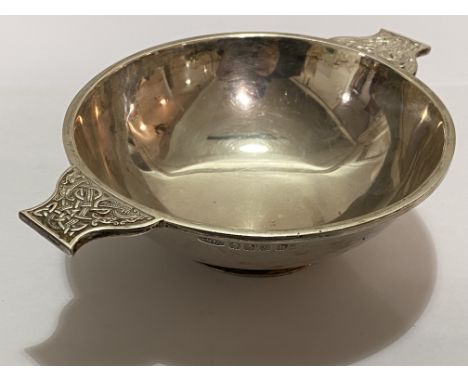 A George V Scottish silver quaich, George Muir Ltd., Glasgow 1930, the handles decorated in relief with a Celtic Knot pattern