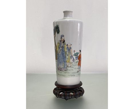 A Chinese famille rose porcelain vase, probably early 20th century, of tapering cylindrical form, painted with figures under 