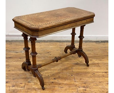 A Victorian figured walnut card table, the rectangular top with chamfered edge, canted corners and Tunbridgeware inlay foldin