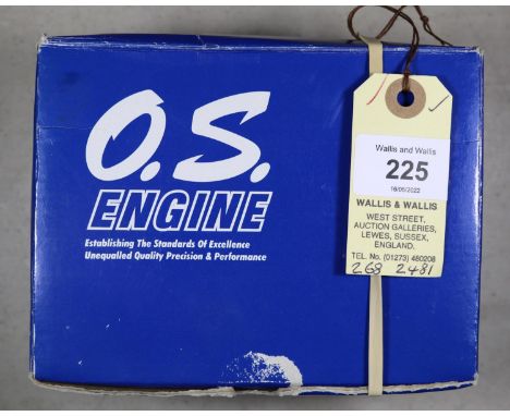 O.S. model aircraft engine for radio controlled aircraft. Model No. FS 56, with silencer. Made in Japan 2005. boxed, minor ag