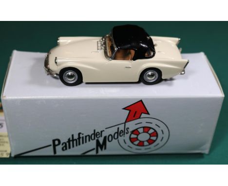 Pathfinder Models 1962 Daimler SP250. In cream with a light brown interior and with a black roof, silver wheels with hubcaps.