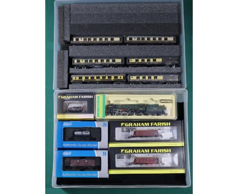 12x N gauge items by Minitrix, Graham Farish, etc. Including a BR Britannia Class 4-6-2 locomotive, 70000, in lined green liv