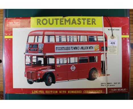 A Sun Star 1:24 scale London Transport Routemaster in red livery with Vernon's Pools and Top Rank Club adverts to sides.  RM2