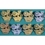 8x British Railways lion and wheel over crown cap badges. 6x brass examples and 2x chrome