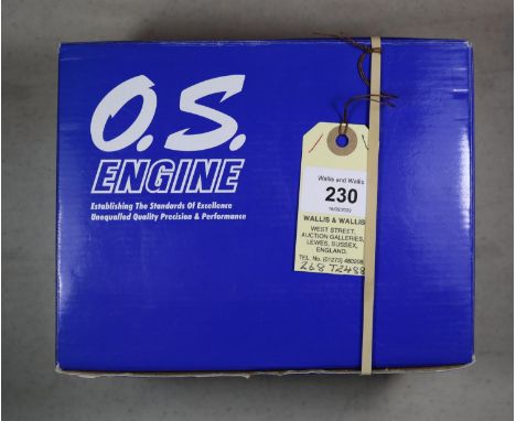 O.S. four stroke model aircraft engine for radio controlled aircraft. Model No. FS 81/34810, with silencer. Made in Japan 200