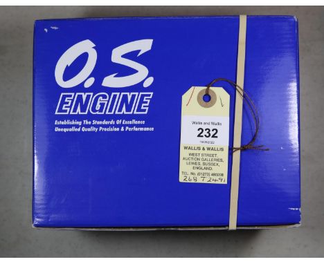 O.S. four stroke model aircraft engine for radio controlled aircraft. Model No. FS 81/34810, with silencer. Made in Japan 200