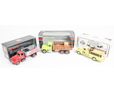 10 First Gear 1:34 scale Trucks. Mack R-Model Stake Truck, Steiger Tractor INC. 1952 GMC Stake Truck with Tyre Load, Patriot 