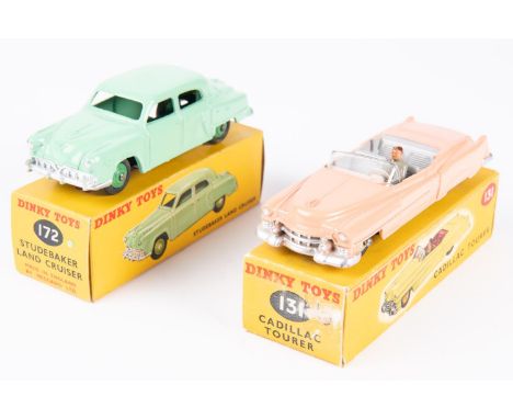 2 Dinky Toys. Cadillac Tourer (131). In salmon pink with grey interior, beige wheels and grey driver. Together with a Studeba