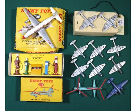 12x Dinky Toys. A trade box of 6x Meteor Twin-Jet Fighters (70E). Bristol 173 Helicopter (715). Vickers Viscount 800 Air Line