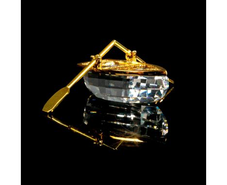 Lead crystal mini piece accented with gold-tone oars. Swarovski impressed backstamp. This item has its original box. Box meas