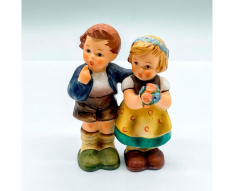 Hand painted figure of a young boy and girl. Goebel backstamp. This item has its original box: 5.75"L x 3.5"W x 3.5"H. Artist