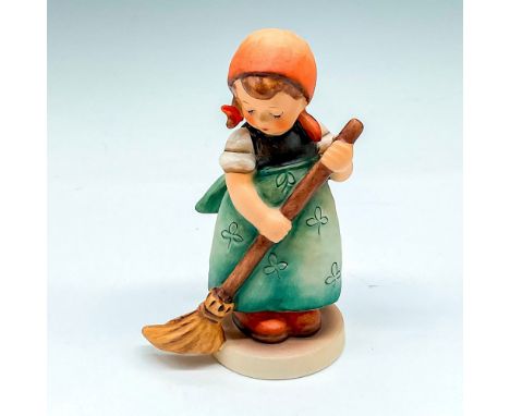 Matte finished figural colored in orange and green holding broom. Goebel backstamp. M.I. Hummel impressed mark. 171. This ite