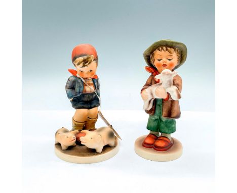 Hand painted porcelain figures. Farm Boy (HUM 66) a young boy looking a pig, and includes display label. Lost Sheep (HUM 68) 