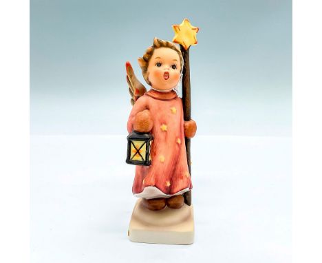 Hand painted figure of an angel holding a lantern and starred staff. Goebel backstamp. This item has its original box: 8.25"L