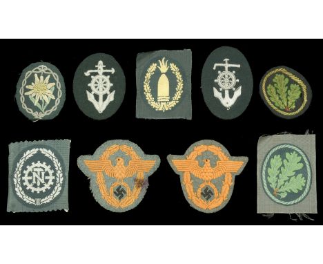 German Second World War Arm Shields. Comprising Edelweiss badge, as removed from a tunic, Bevo woven. Jager arm badge, machin