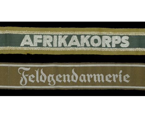 German Second World War Afrika Korps and Feldgendermerie Cuff Titles. Bevo type with Afrika Korps in silver weave, shortened 