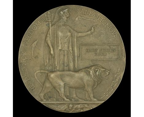 The Memorial Plaque awarded to Private E. G. Tudor, 2nd Battalion, Manchester Regiment, who was killed in action by the Arabs