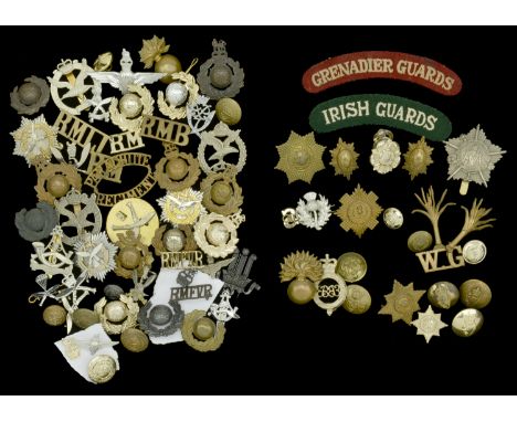 Military Badges. A selection of Military badges including cap badges of the Royal Marines, Artillery, Light Infantry, Band, P