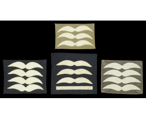 German Second World War Luftwaffe Flight Suit Insignia. Comprising Hauptmann, three gulls and one stripe on dark blue backgro