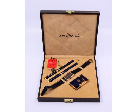 A Du Pont lighter watch and pen set Gifted By King Hussein of Jordan to the current vendor 