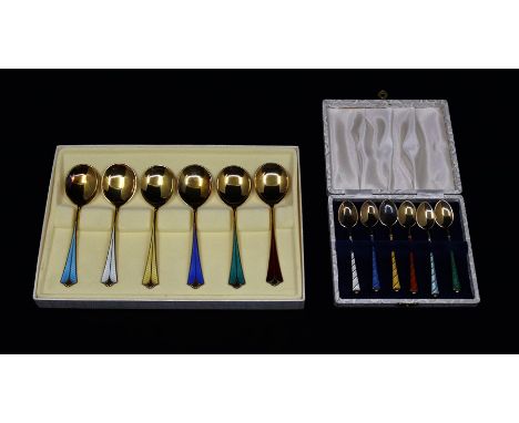 A box of Norweigan silver enamel spoons and similar cased set&nbsp;