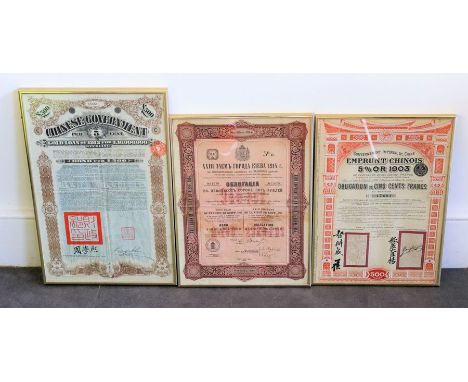 Two framed Chinese Share certificates and a further share certificate&nbsp;