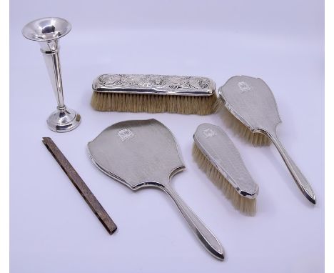 A George VI silver mounted engine-turned Dressing table set: mirror and two brushes BRM 1948, together with a silver embossed