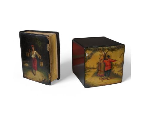 A late 19th / early 20th century Russian lacquer tea caddy and photograph album, largest 16cm high. Condition - fair/good