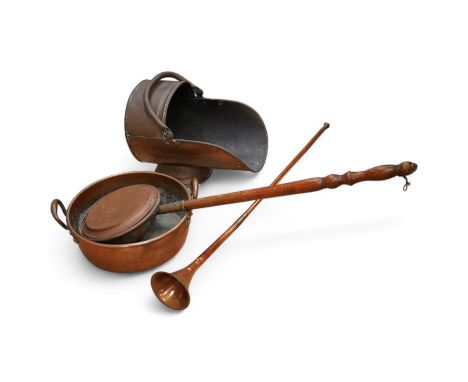Victorian copper, including a two handled preserve pan, a copper hunting horn, a helmet coal scuttle and a warming pan. Scutt