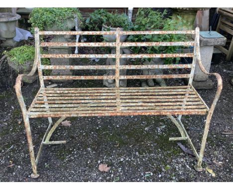 A 19th century white painted slatted wrought iron garden bench, width 122cm, depth 45cm, height 88cm. Condition - poor to fai