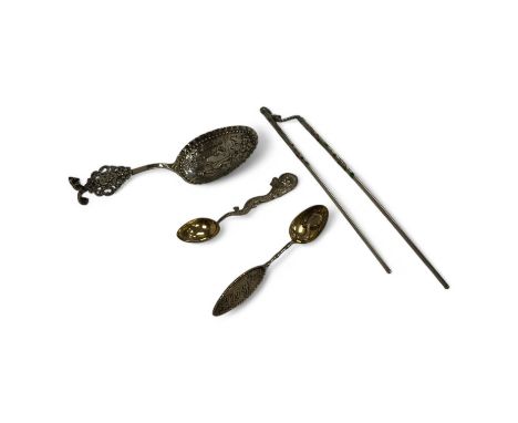 An early 19th century continental silver spoons, with embossed bowl and pieced terminal, import marks for Elly Isaac Miller, 