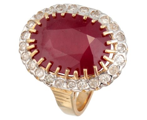 Vintage 10K. yellow gold entourage ring set with approx. 0.24 ct. diamond and ruby. Set with 24 brilliant cut diamonds of app