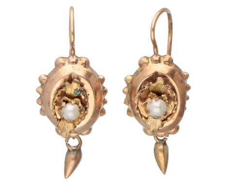 Antique 14K. yellow gold earrings each set with a seed pearl. Hallmarks: oak leaf. In lightly worn condition. LxW: 2.3 x 0.9 