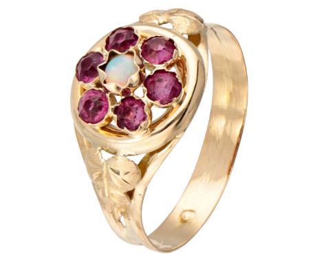 Vintage 14K. yellow gold ring set with opal and red colored stones. Hallmarks: 585. Set with a cabochon cut opal of approx. 0