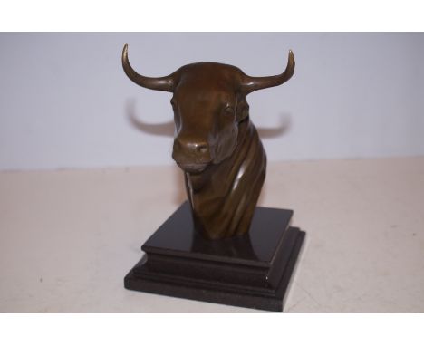 Bronze bull head on marble base