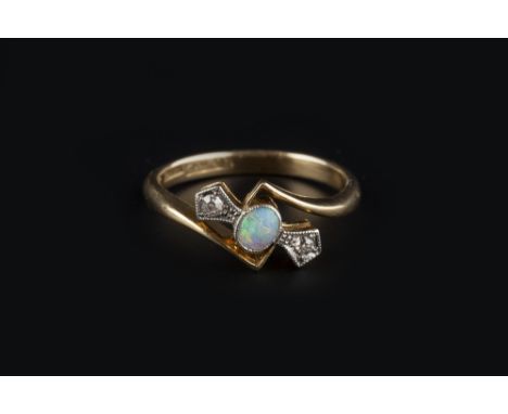 AN OPAL AND DIAMOND DRESS RING, the oval cabochon opal millegrain collet set between two circular-cut diamonds, two colour pr