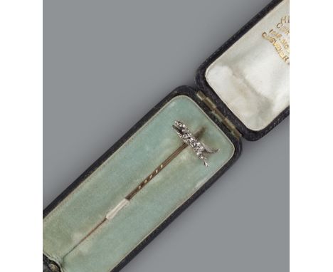 TWO VICTORIAN STICK PINS, the first modelled as a hunting hound, with rose-cut diamond set body and cabochon set eye, in fitt