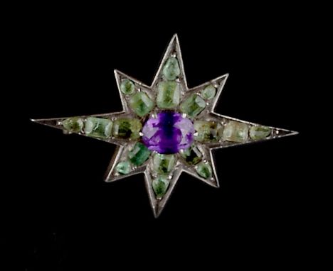 AN AMETHYST AND GEM SET STAR BROOCH, with closed-back setting, adapted with later brooch and pendant fittings, and a peridot 