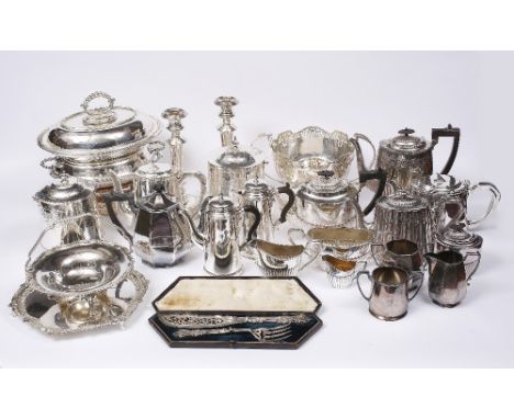 A COLLECTION OF SILVER PLATED WARES TO INCLUDE: a bachelors coffee pot with matching hot milk jug, a pair of candlesticks wit