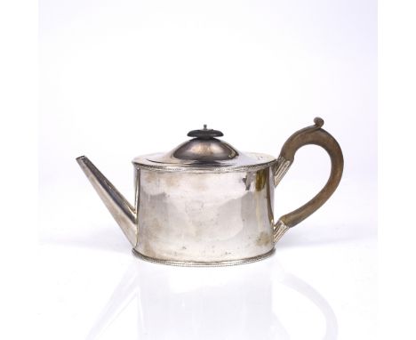 A GEORGE III PLAIN OVAL TEAPOT with beaded edges and plain domed hinged top, wooden handle and finial, 13.5cm high, London 17