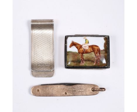 A 9CT GOLD CASED FRUIT KNIFE with steel blade, 5.5cm long, a silver money clip and a silver and enamel snuff box with racehor