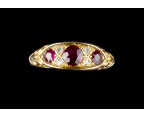 A RUBY AND DIAMOND HALF HOOP RING, the trio of circular mixed-cut rubies spaced by pairs of single-cut diamonds, 18ct gold mo