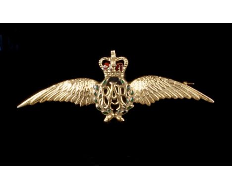 AN ENAMEL RAF WINGS BROOCH, heightened with red and green enamel decoration, 9ct gold mounted, and a pair of oval enamel cuff
