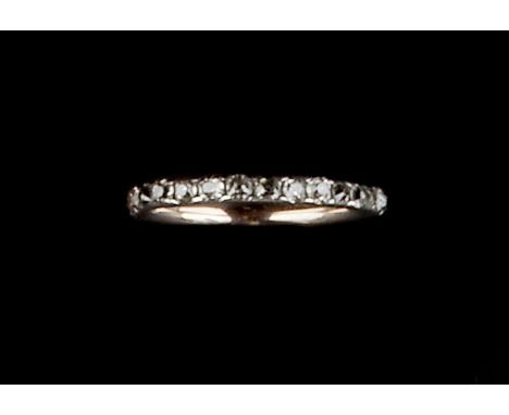 AN ANTIQUE DIAMOND FULL HOOP ETERNITY RING, set throughout with old-cut diamonds in closed-back settings, gold and silver mou