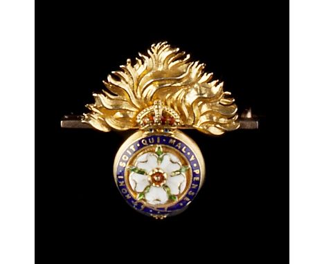 AN ENAMEL REGIMENTAL BROOCH, for the Royal Fusiliers, heightened with polychrome enamel decoration, yellow precious metal mou