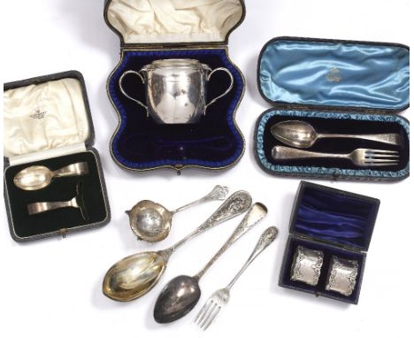 A CASED PAIR OF EDWARDIAN NAPKIN RINGS with scroll decoration in relief by Gorham Manufacturing Co. 1904; a cased christening