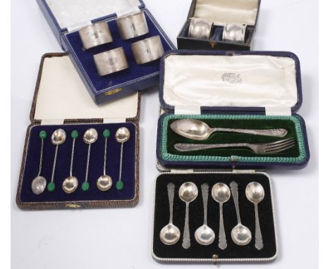 FIVE CASED SILVER SETS TO INCLUDE: a set of four napkin rings, Birmingham 1948, a pair of napkin rings, a christening fork an